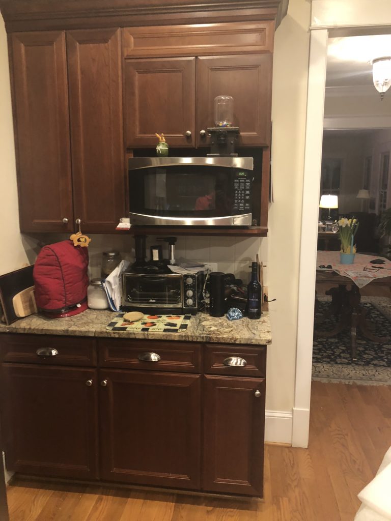 Replacing wall cabinets with floating shelves opens up a tight space.  