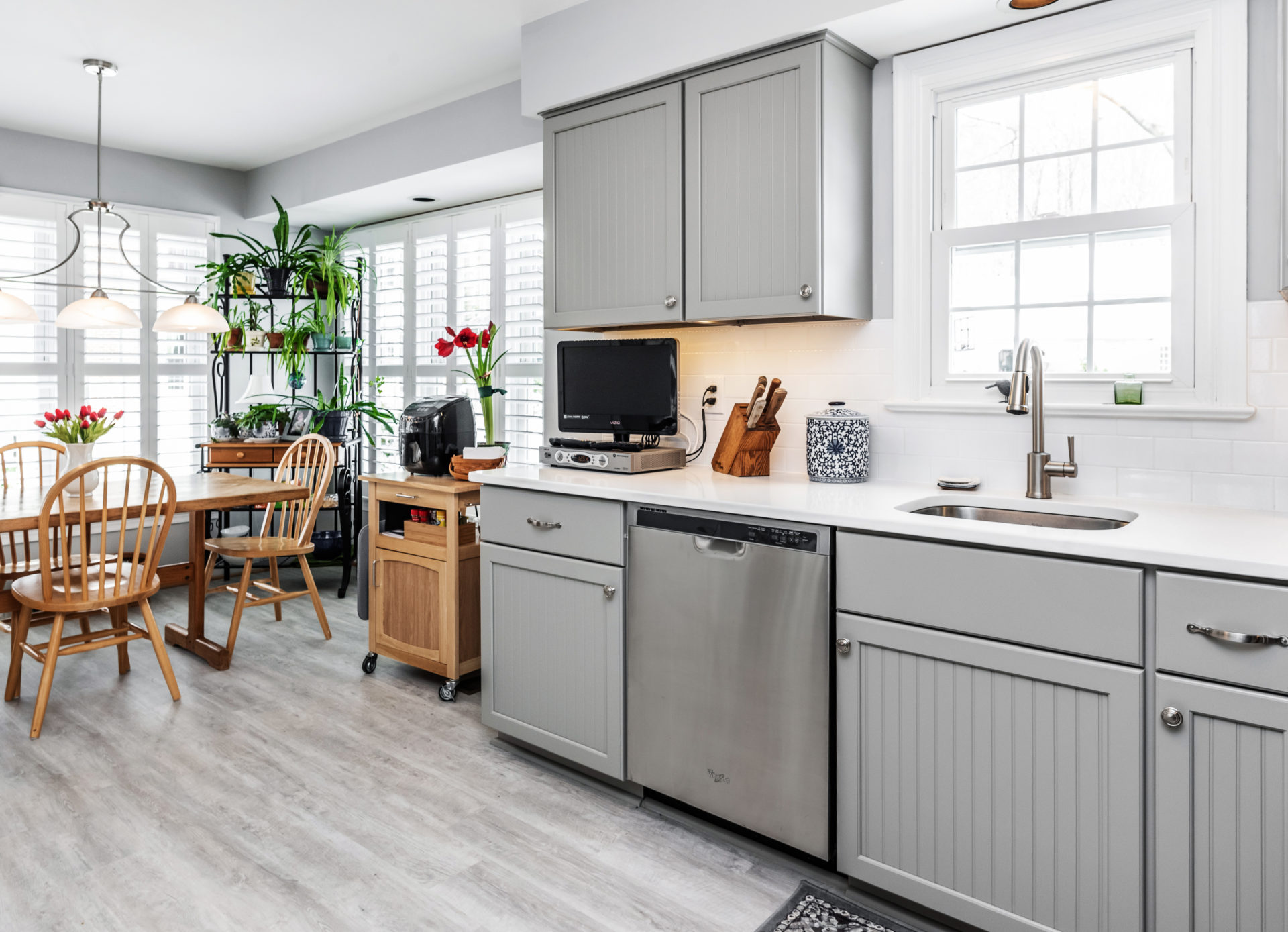 Kitchen Appliances Cabinet With Gray Garage Door - Transitional