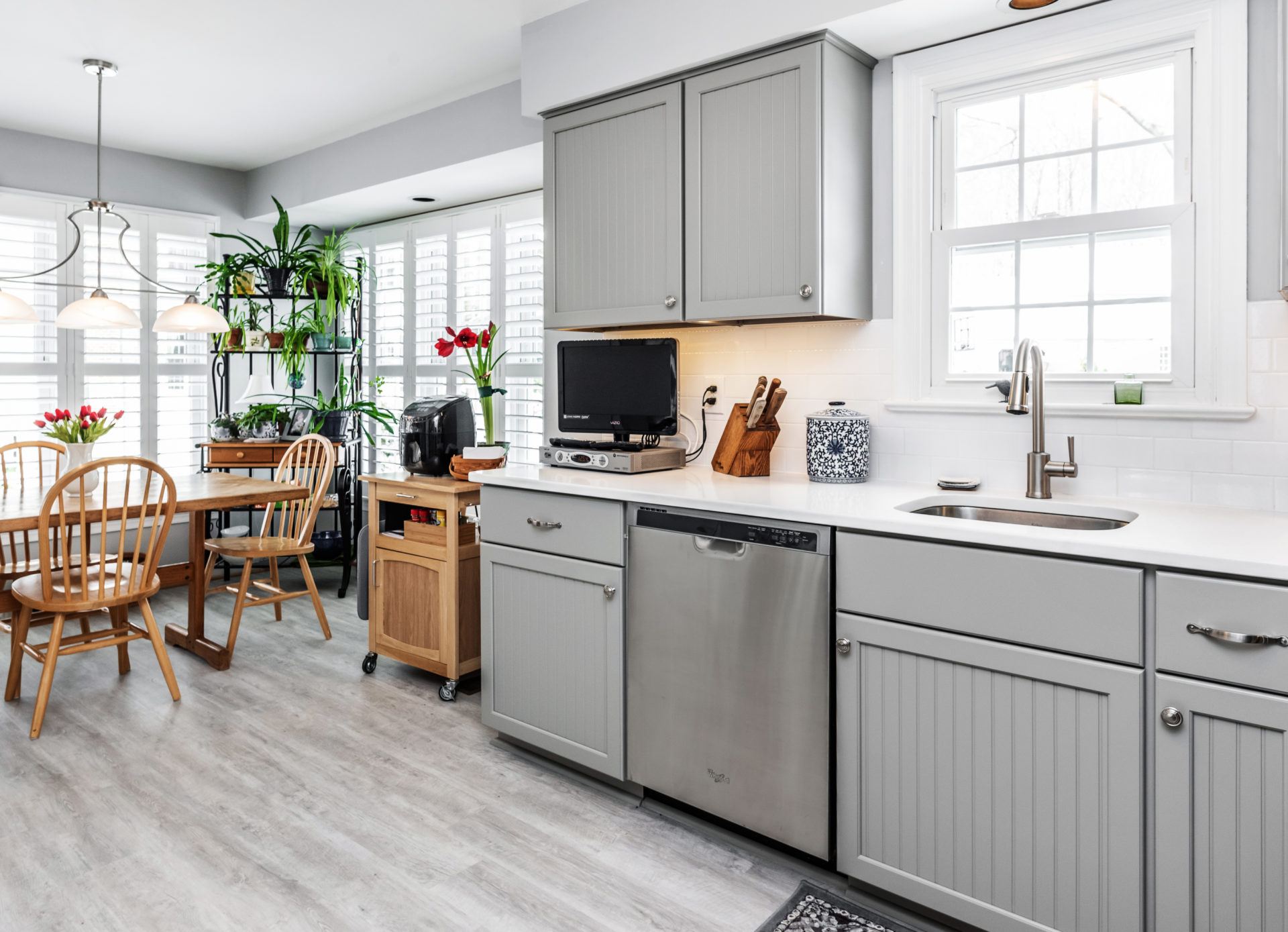 beadboard kitchen cabinet with waterfall light