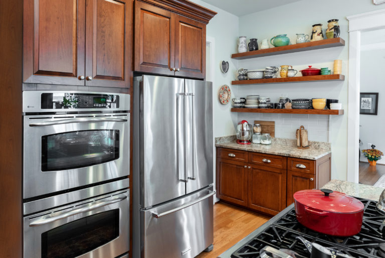 New full overlay cabinet doors and concealed hinges update the look.  