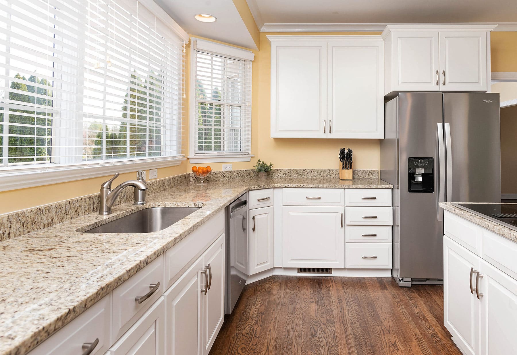 New full overlay cabinet doors and concealed hinges bring the kitchen up to date.