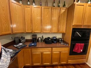 Polished wooden cabinets in a home kitchen