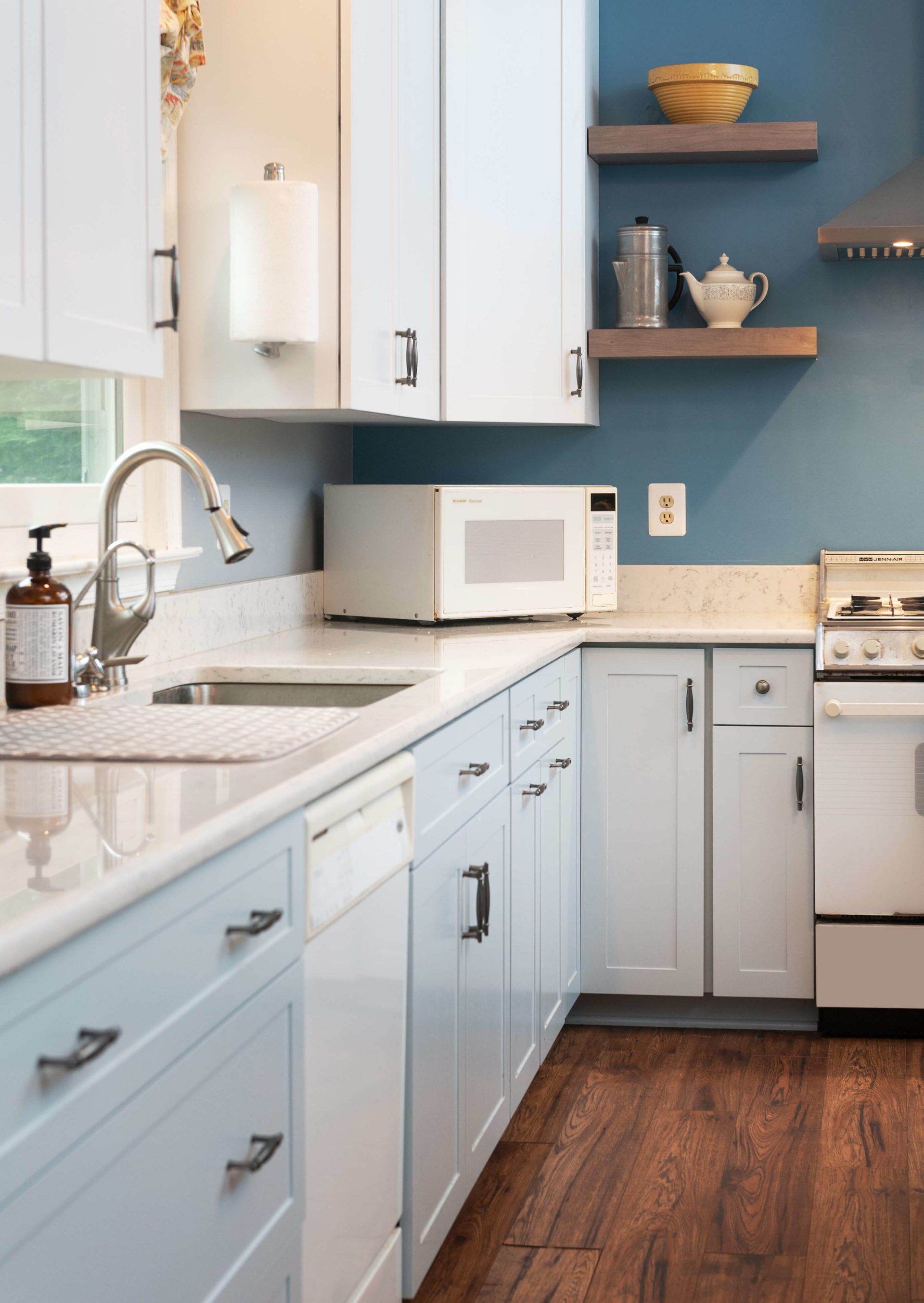 https://www.kitchensaver.com/wp-content/uploads/2021/08/Light-Blue-White-MDF-Cabinets-White-Floating-Shelves-Ashburn-MD-09.jpg-1920x2708.jpg