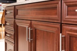 Close-up of dark-colored laminate cabinet doors