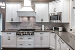 Stunning Modular kitchen having wooden white interior.