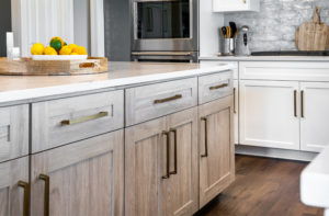 A kitchen installed cabinet drawers and doors.