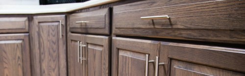 These oak cabinet doors have a driftwood stain on them to produce this color.